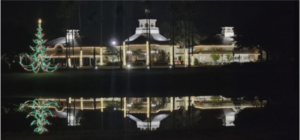 the clubhouse lit up with christmas lights